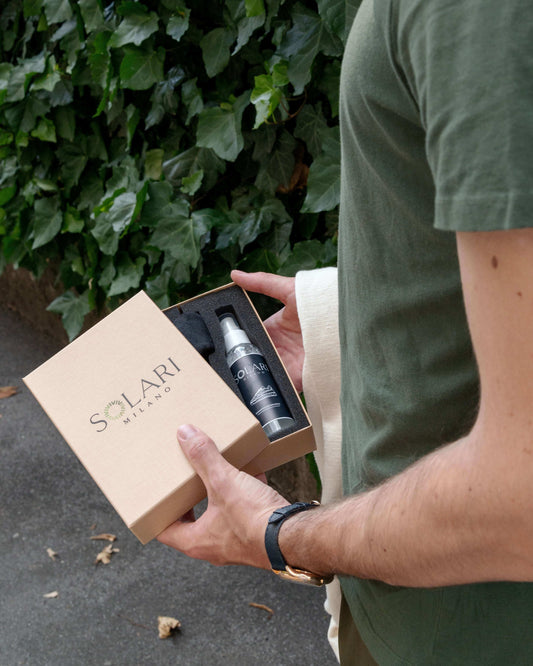 Person holding a SOLARI Milano gift box, featuring thoughtful products, ideal for the Best Vegan Gifts.
