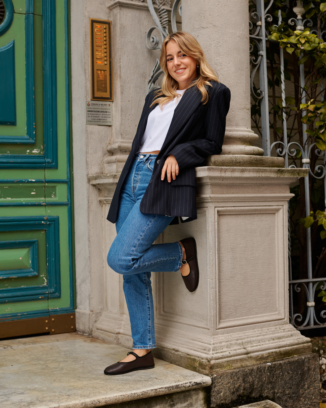 Benni wearing Le Orsine Brown vegan friulane slippers 