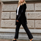Benni wearing Le Orsine Black vegan friulane slippers 