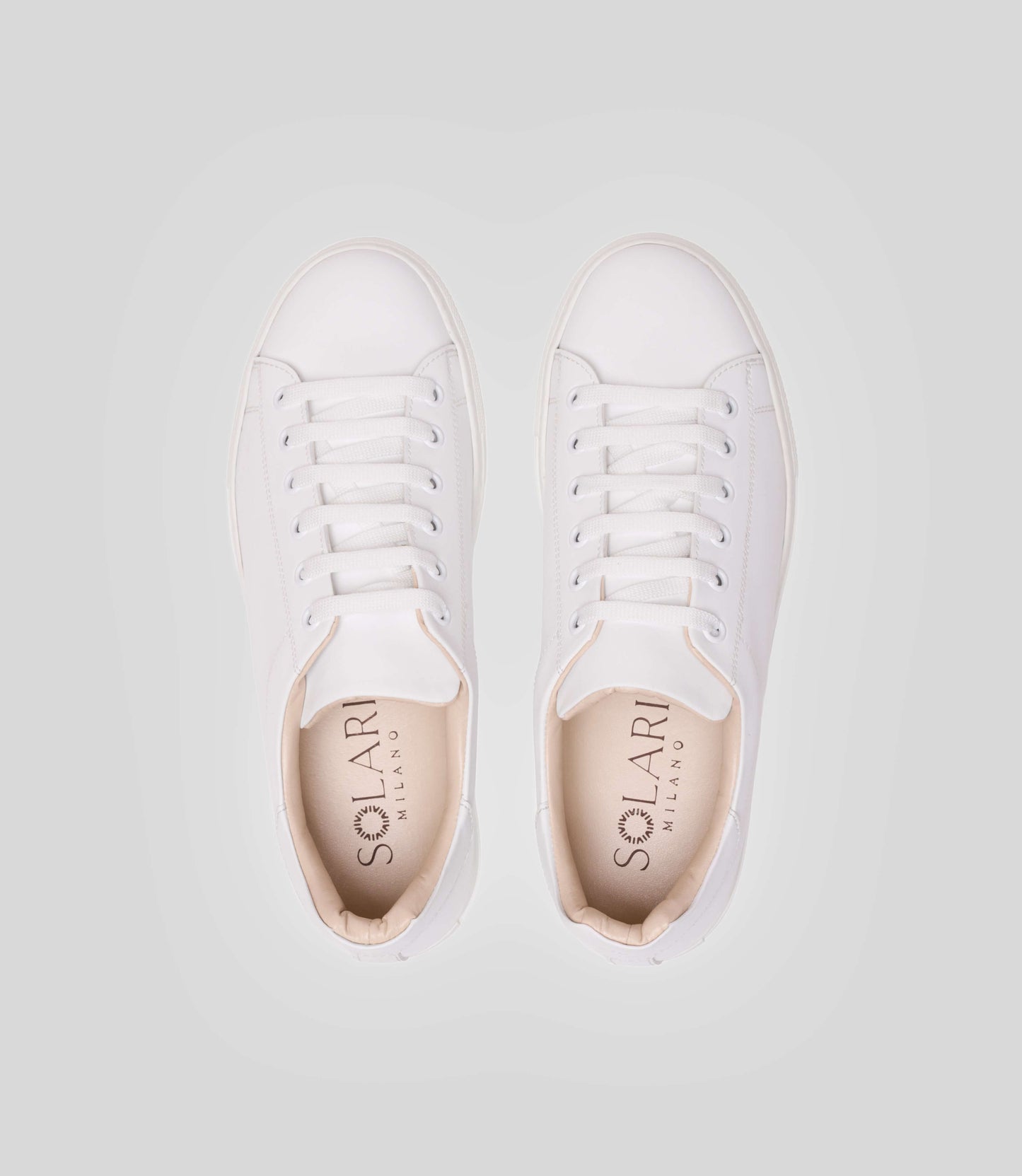 Vegan sneakers handmade in Italy, Solari Milano's Vegan Sneaker L1 in white, featuring breathable microfiber and a comfortable design.