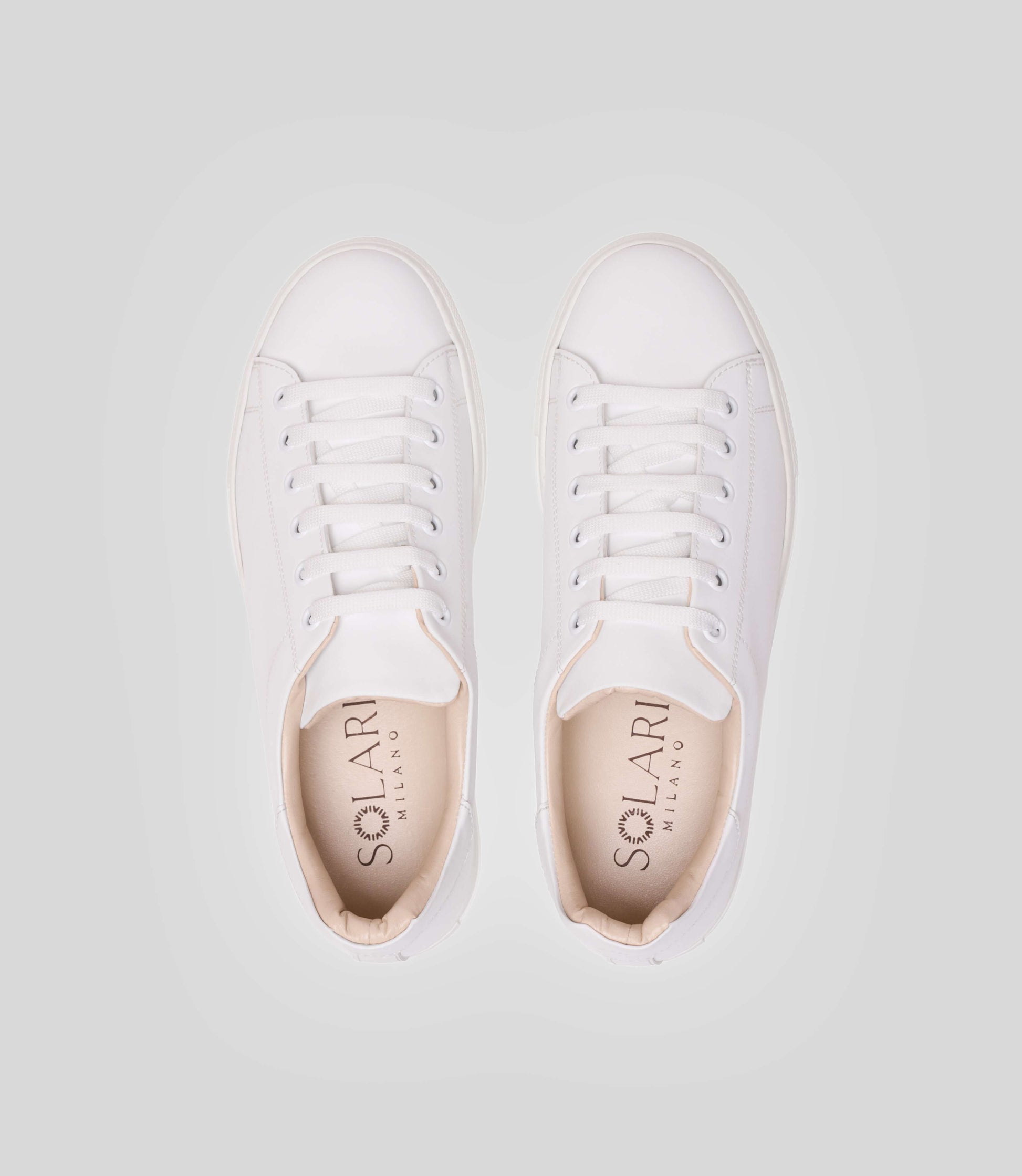 Vegan sneakers handmade in Italy, Solari Milano's Vegan Sneaker L1 in white, featuring breathable microfiber and a comfortable design.